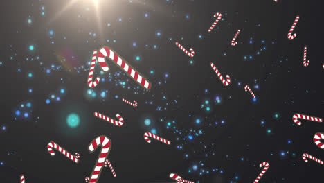 multiple candy cane icons falling against blue spots of light on black background