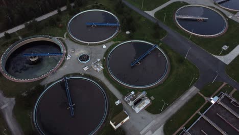 aerial view of wastewater treatment plant at sunset, filtration of dirty or sewage water.