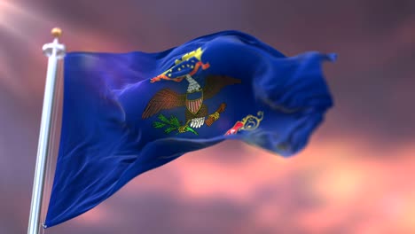 flag of north dakota state, region of the united states, waving at sunset - loop