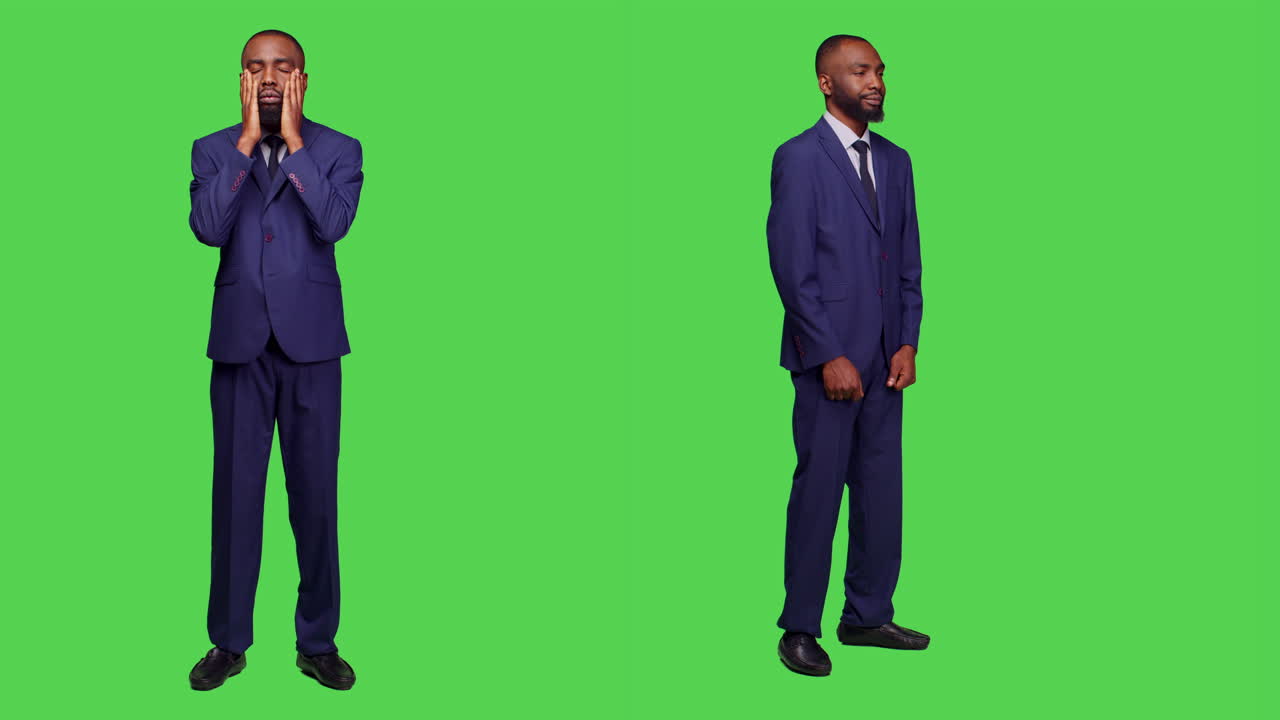 Um empresário de terno está em frente a um green screen