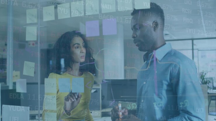 Animation of financial data processing over diverse business people in office