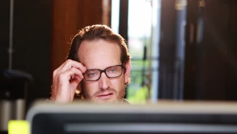 man working on computer