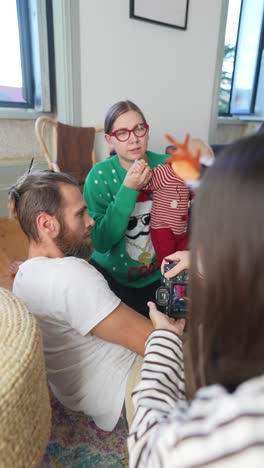 family celebration with baby during christmas holidays