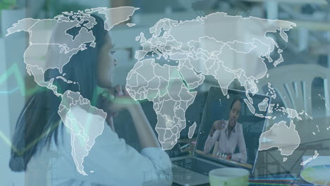 animation of world map over biracial woman having video call on laptop