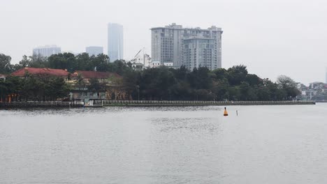 urban skyline view with river foreground