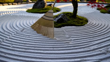 zen garden with raked sand and bonsai