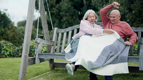 Nature,-blanket-and-senior-couple-on-a-bench