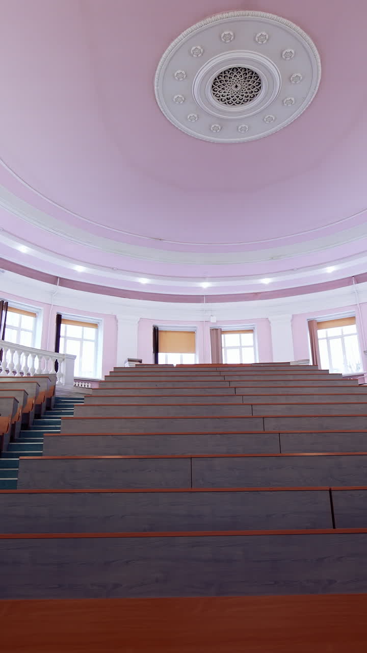 Big empty lecture room for study. Pandemic university classroom. Vertical video