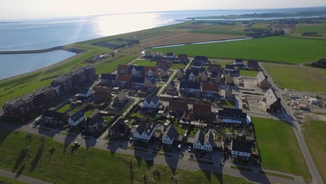 Aerial-shots-of-a-new-neighborhood-near-the-sea-in-Kruiningen,-the-Netherlands