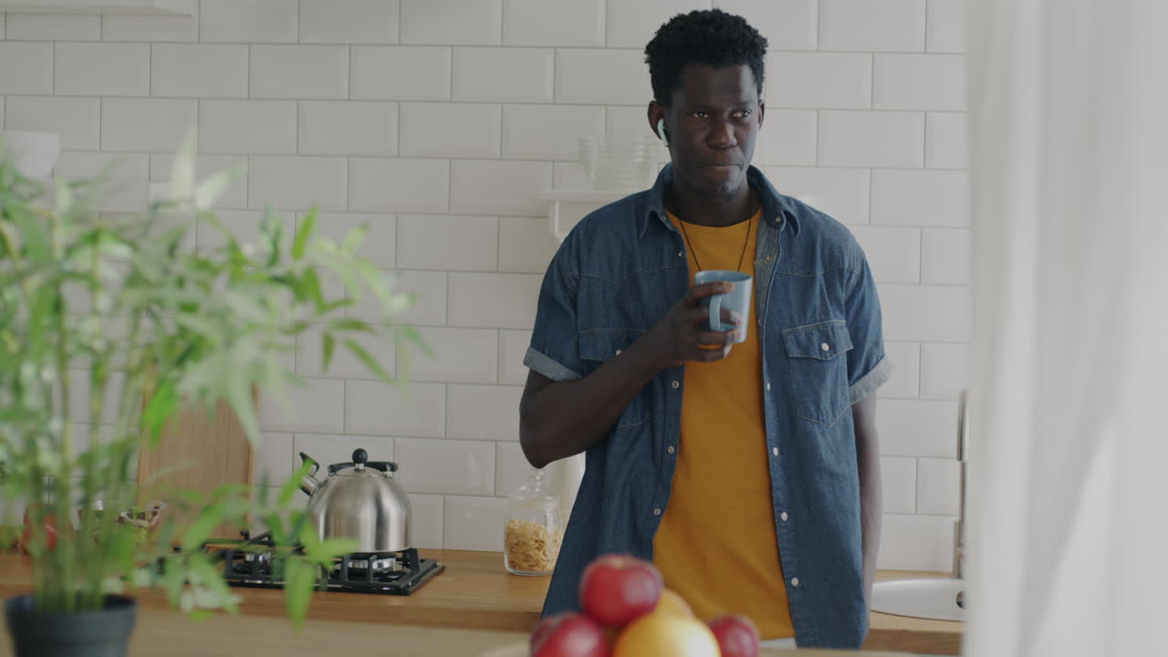 Man enjoying coffee in the kitchen