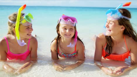portrait of caucasian girls in swimwear and snorkels