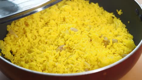 yellow rice in a pan