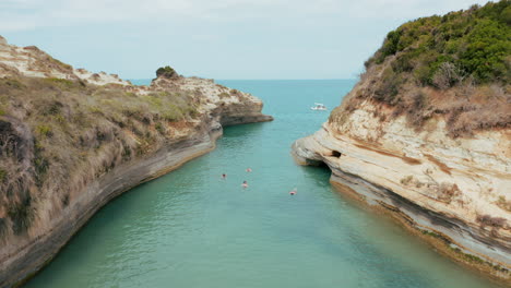 Low-flying-drone-footage-of-Canal-d'Amour-located-in-Corfu-Island,-Greece,-Europe