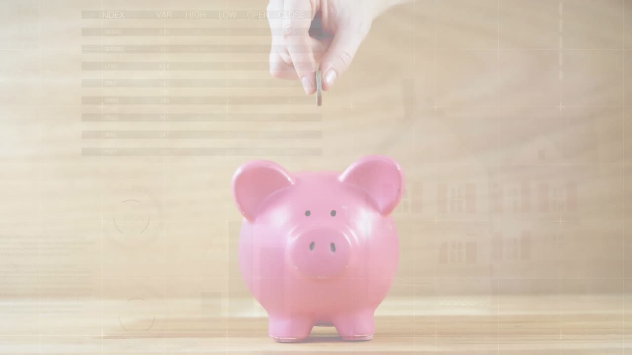 Animation of alarm clock falling on table and cropped hand of woman inserting coin in piggybank