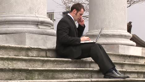 Stock-Footage-of-Businessman-Working-Outdoors