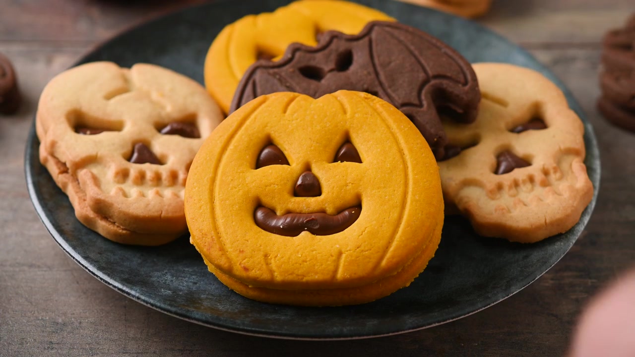 Serving assorted Halloween cookies