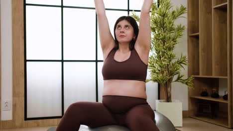 woman doing yoga indoors