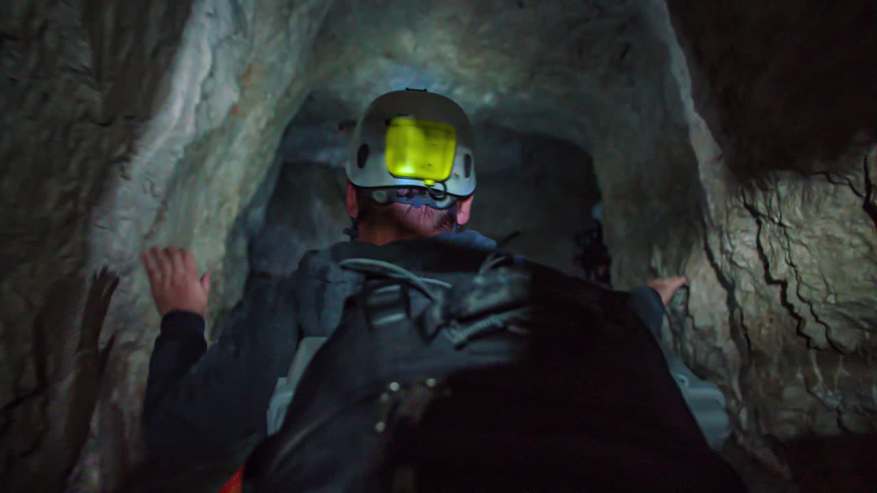 Kayaking in the narrow streams of Mezica mine museum cave