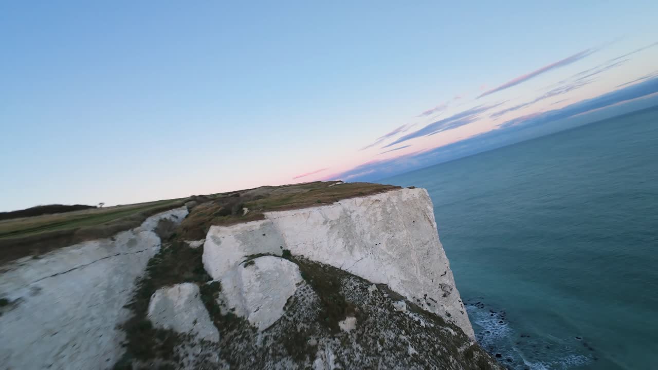 The Dover Cliffs, the English coast, the Strait of Dover, cliff faces, Sea, adventure and outdoors. Several species of birds nest in the cliff face, such as the northern fulmar and the kittiwake. FPV