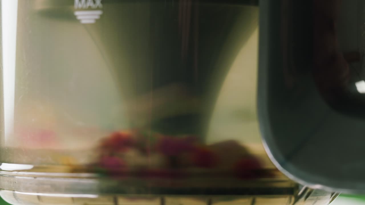 Colorful Ingredients Being Chopped in a Food Processor