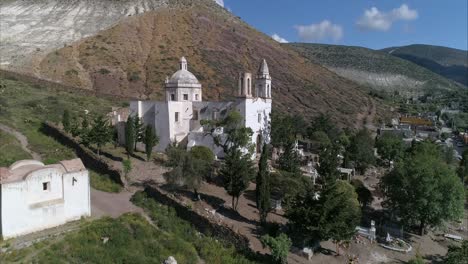 Aerial-shot-of-the-Chapel-of-Guadalupe-in-Real-de-Catorce,-San-Luis-Potosi-Mexico