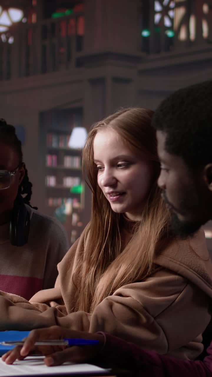 Vertical video multicultural students group discussing financial project for university course