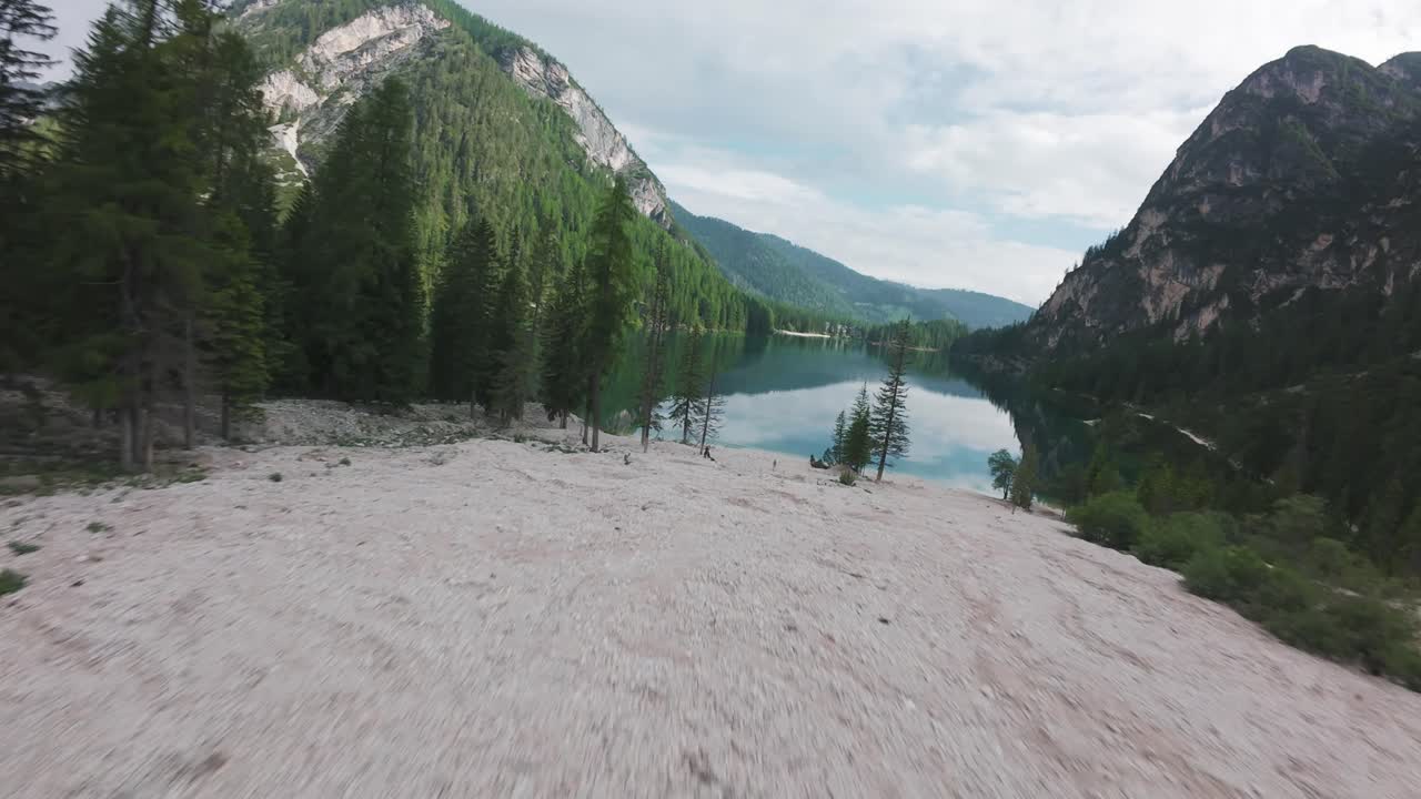 Serene Alpine Lake Surrounded by Majestic Mountains