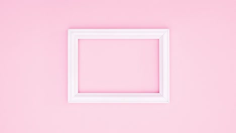 romantic roses appear and disappear around white frame for text on pink theme. stop motion