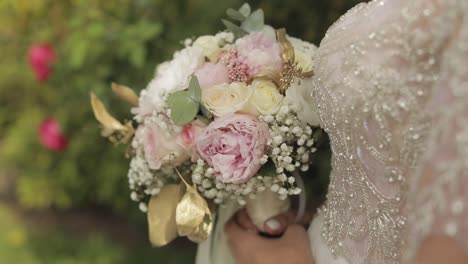 bride holding a beautiful wedding bouquet