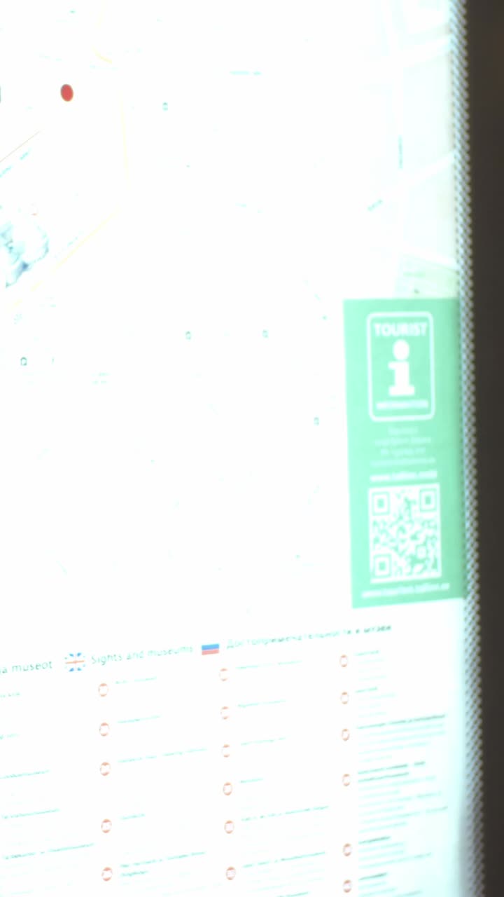 A couple using technology indoors