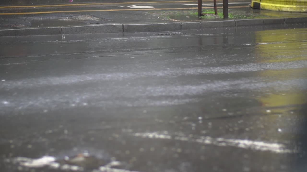 Car Tyres Driving Over Deep Pond And Splashing Water In Slow Motion