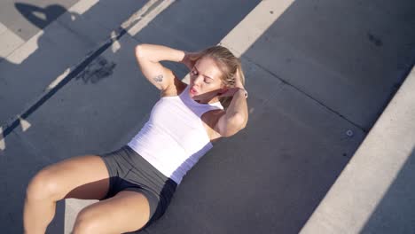 woman doing abs workout on stairs