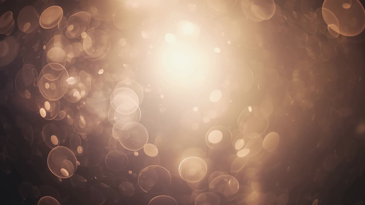 Glowing center golden bokeh cluster after focus shift in dark, expanding into soft bloom with speck
