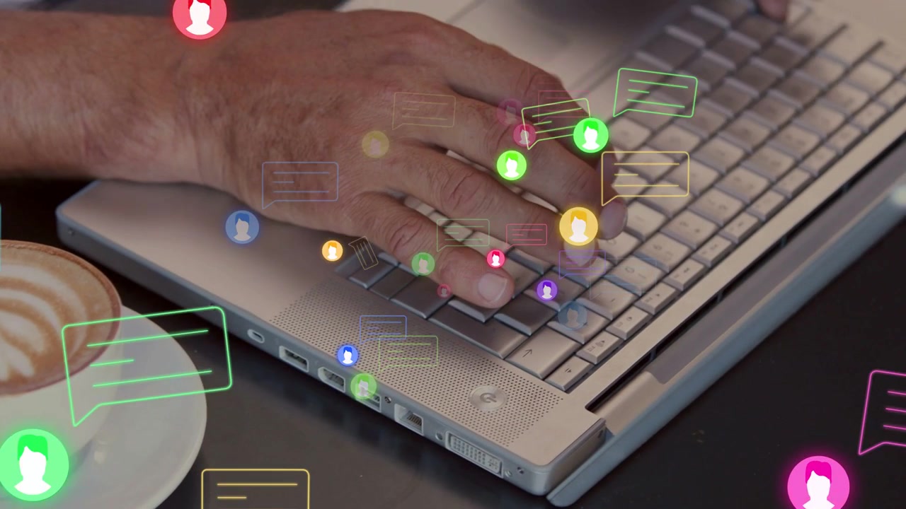 Man typing on laptop, chat icons appearing and clustering around keys, responding business messages