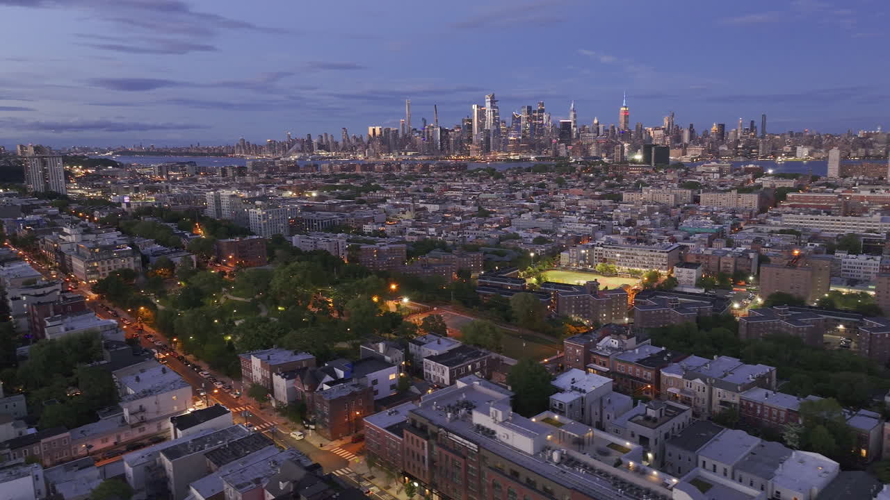 Aerial view of Hoboken at night. Shot with Midtown Manhattan in the background.