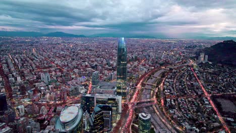 Aerial-view-dolly-in-of-the-towers-in-the-business-center-in-Santiago,-Chile