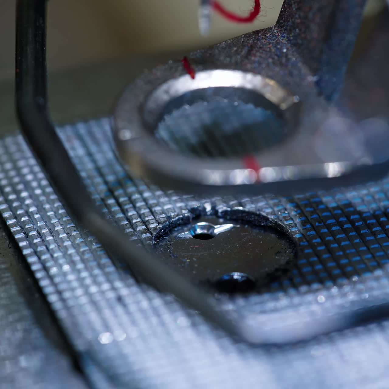 Tailor working at sewing factory. Female tailor using sewing machine at workshop
