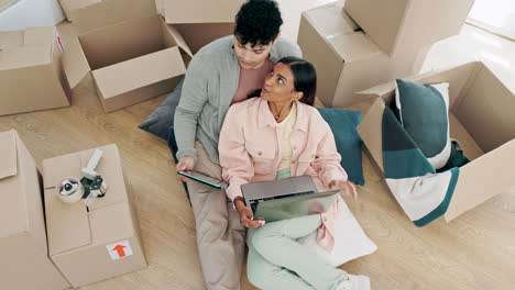 Happy-couple,-real-estate-and-laptop-with-boxes