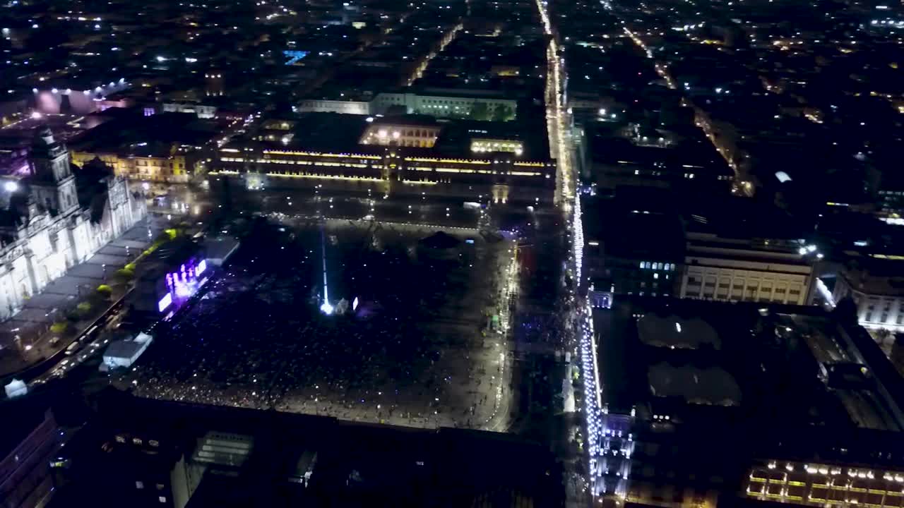 Aerial View of a Large Concert in a City Square at Night