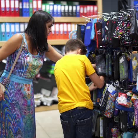 boy shopping for back to school
