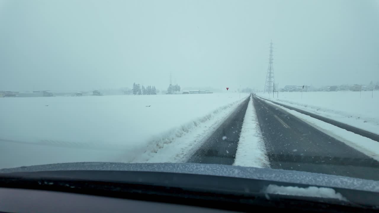 A peaceful winter drive through snowy farmlands and open landscapes