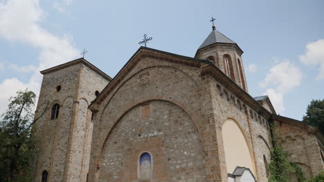 a beautiful low angle panning view of a serbian orthodox church, the pilgrim of first christianity