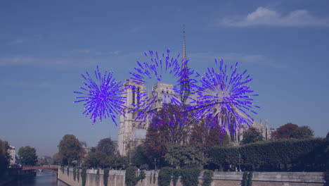 animación de fuegos artificiales azules sobre el paisaje urbano de notre dame y los árboles.