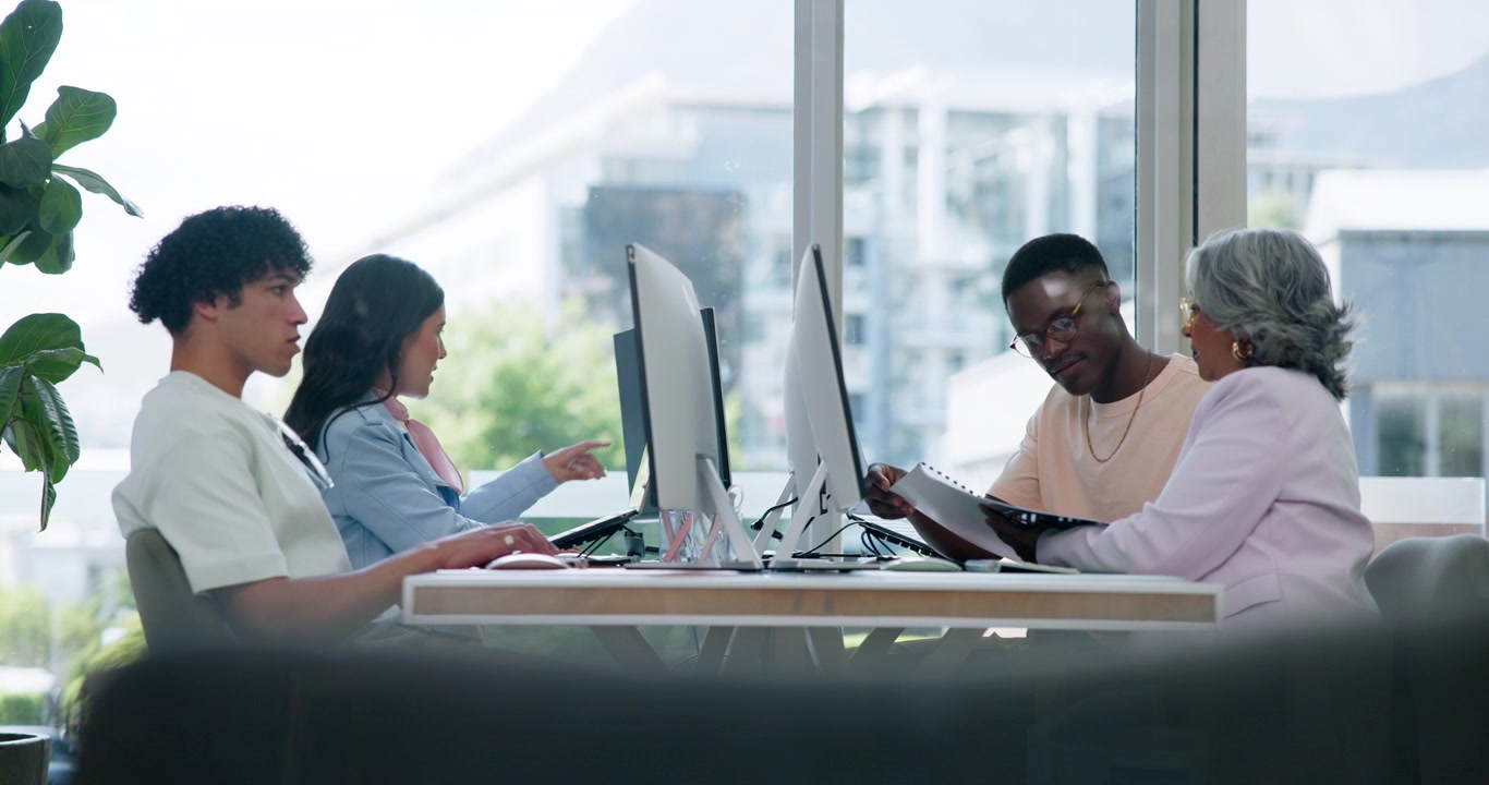 Diverse Team Collaborating in a Modern Office Workspace
