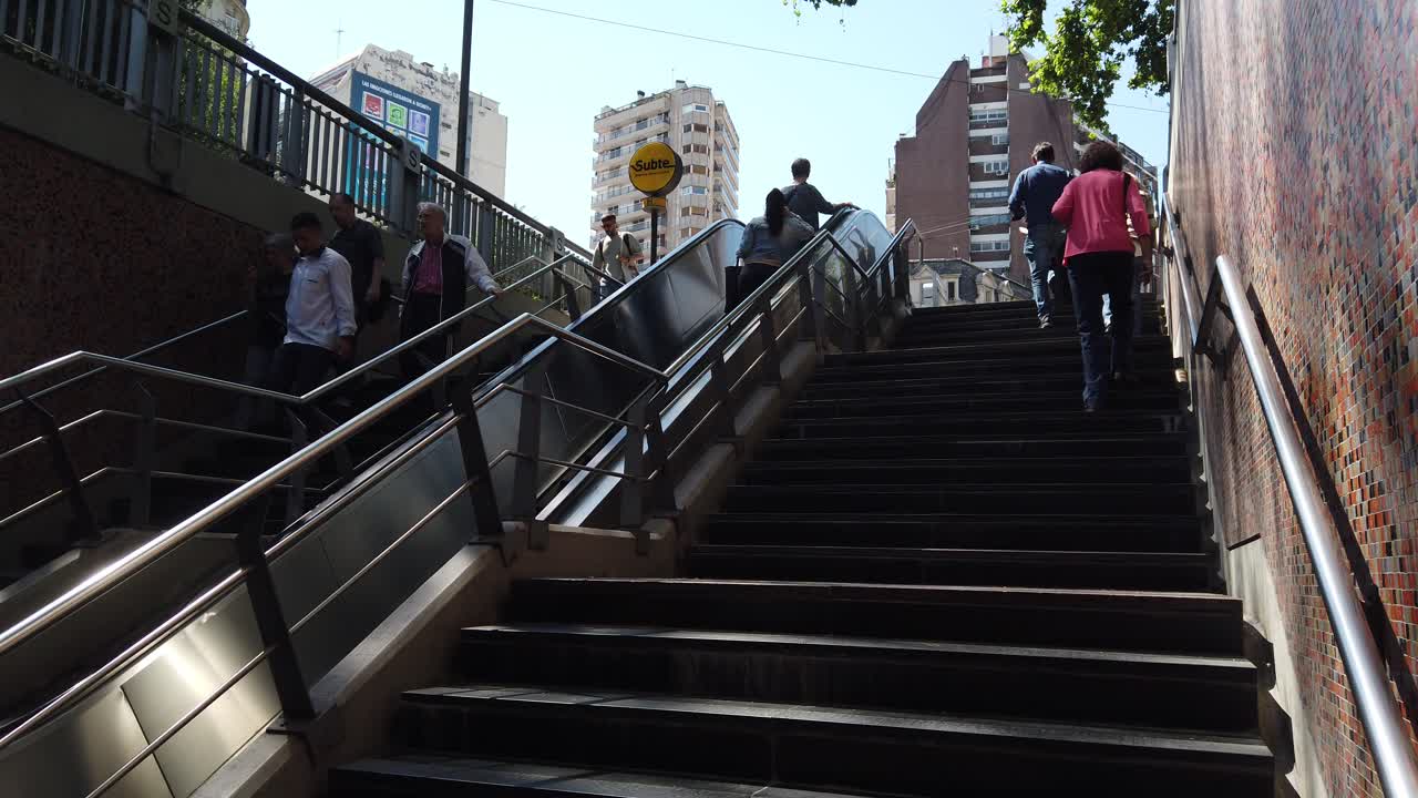 Establisher of People going downstairs at Buenos Aires Underground Subway station of Las heras Argentina at daylight