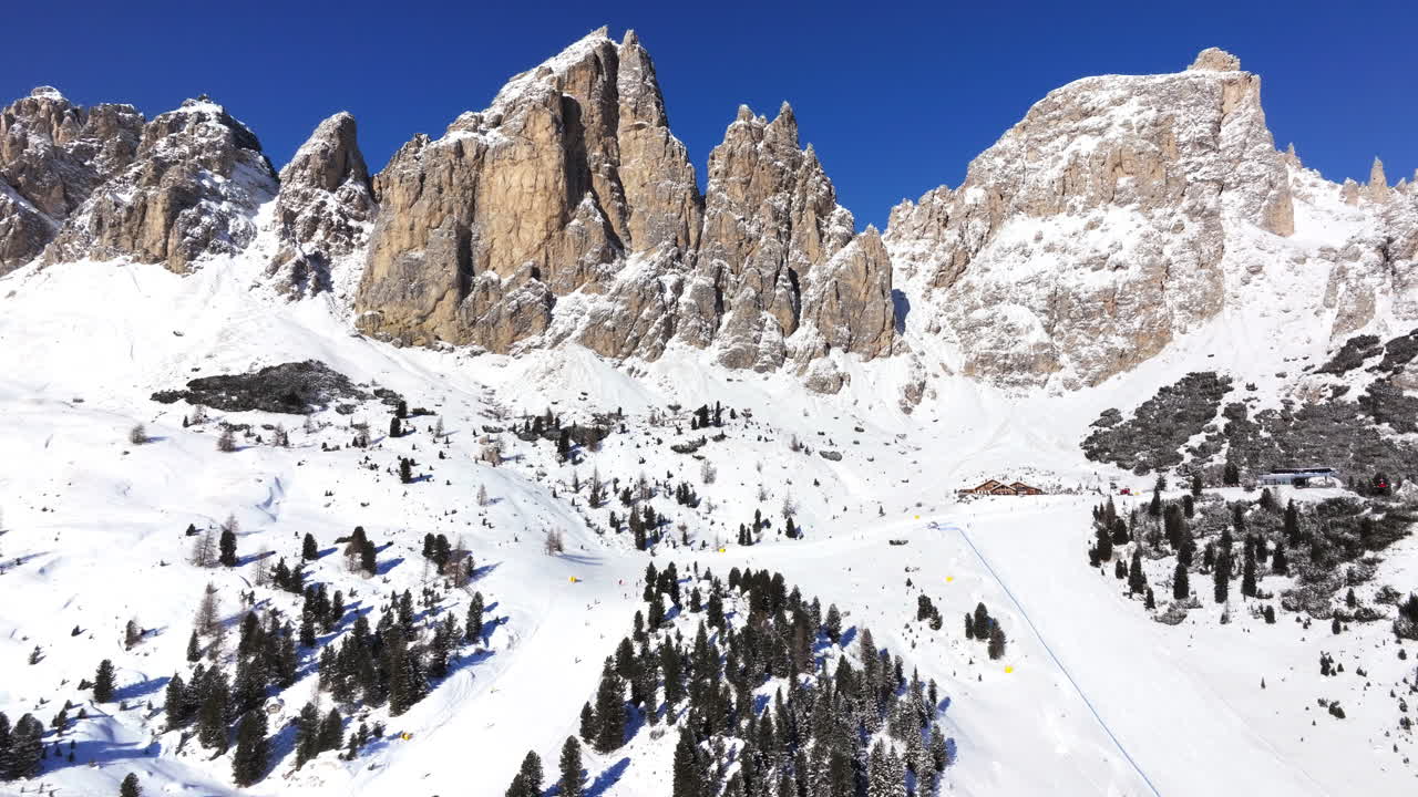 Aerial drone view of the Gardena Pass high mountain pass in the Dolomites, Italy