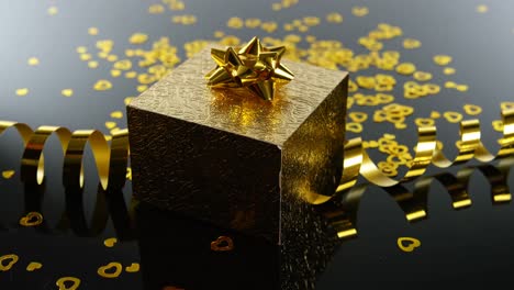 Goldene-Geschenkbox,-Luftschlangen-Und-Herzförmiges-Konfetti-Auf-Schwarzer-Oberfläche-4k