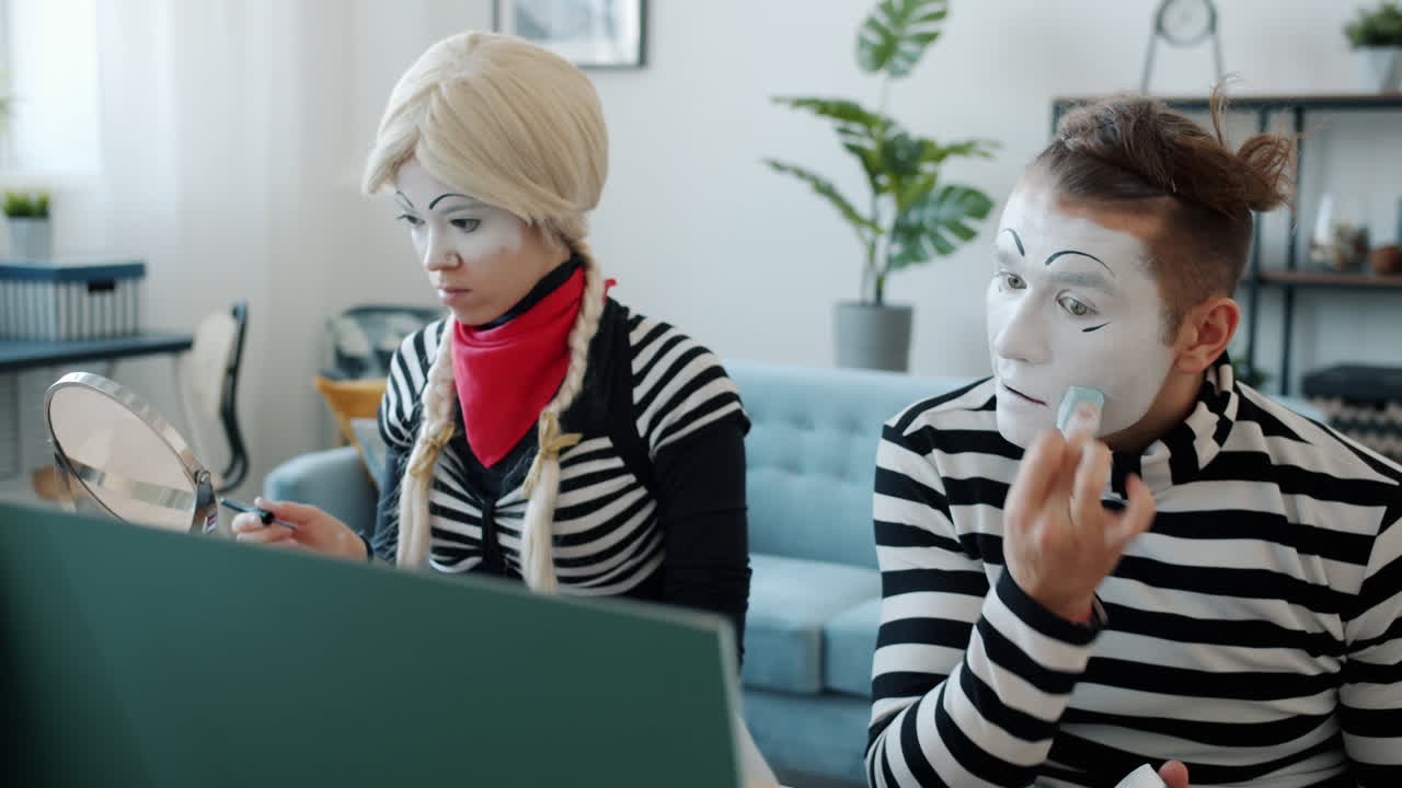 Mime Artists Applying Makeup