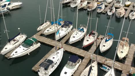 aerial of marina with sailboats docked