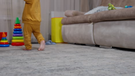 toddler walking in living room
